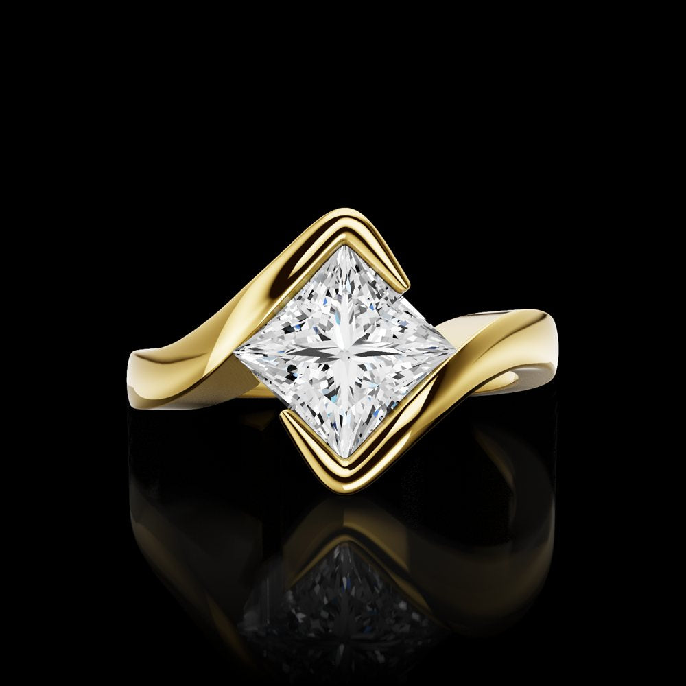 A princess-cut diamond set on point in a sculptural yellow gold bypass setting